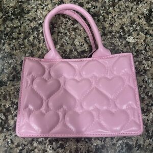 Mini Pink Heart Purse with Crossbody strap.